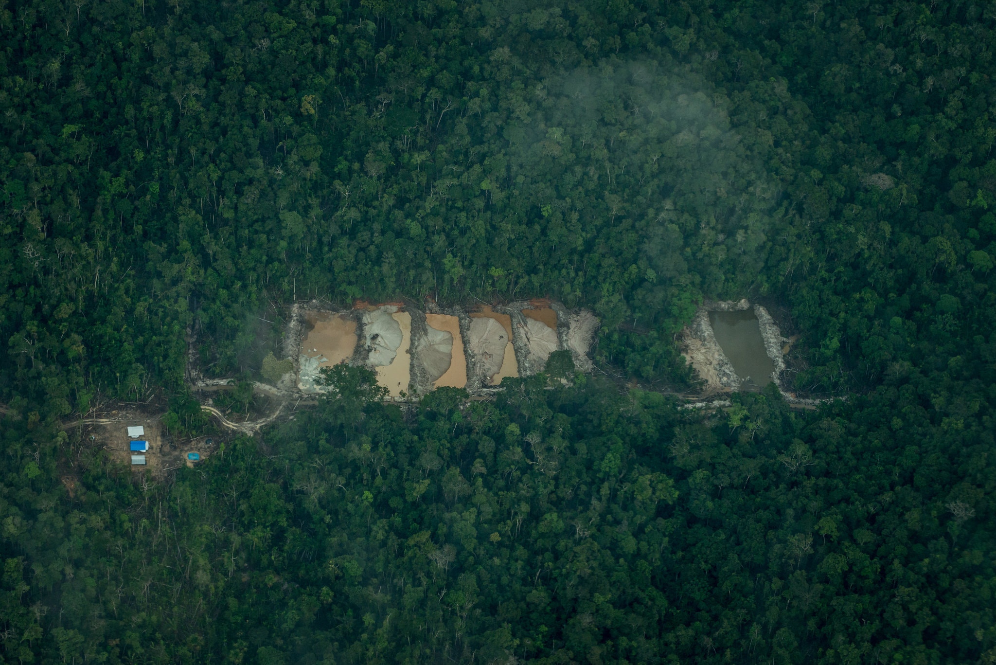 Illegal gold mine in Posto de Vigilância, or Lookout Point, a Munduruku village. Credit Meridith Kohut for The New York Times